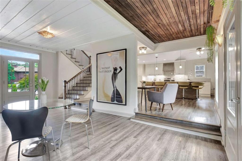 4 Northlake Circle Peachtree City, GA 30269 - Photo 8 of 33 a dining room with furniture and wooden floor