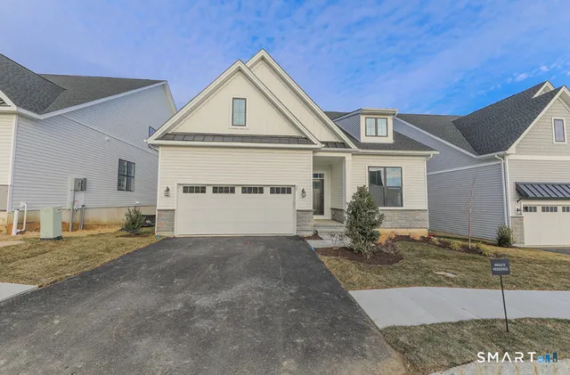 a view of a house with a sink and yard