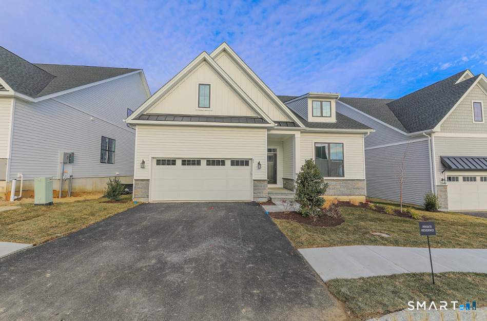 a view of a house with a sink and yard