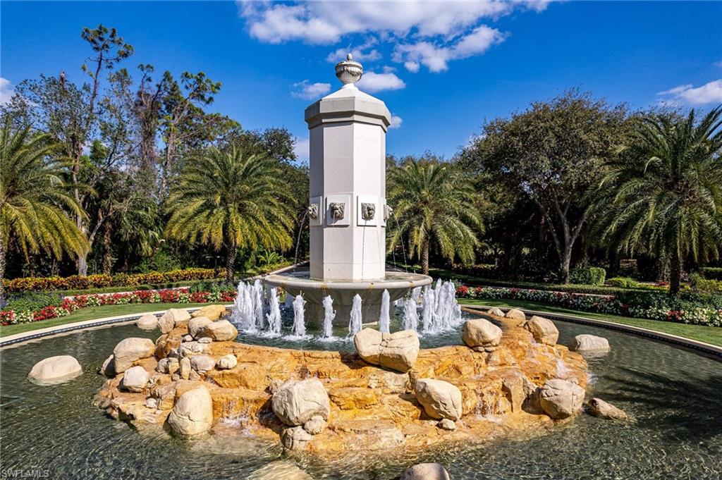 16741 Cabreo Drive Naples, FL 34110 - Photo 8 of 22 a front view of house with yard and swimming pool