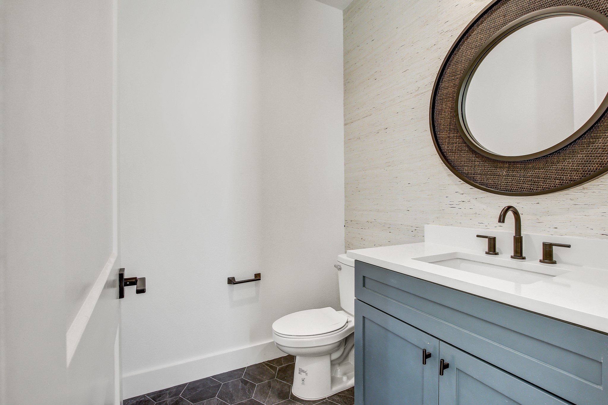 4127 East 12th Street, Unit 4 Austin, TX 78721 - Photo 9 of 32 Bathroom featuring vanity, tile patterned flooring, toilet, and baseboards