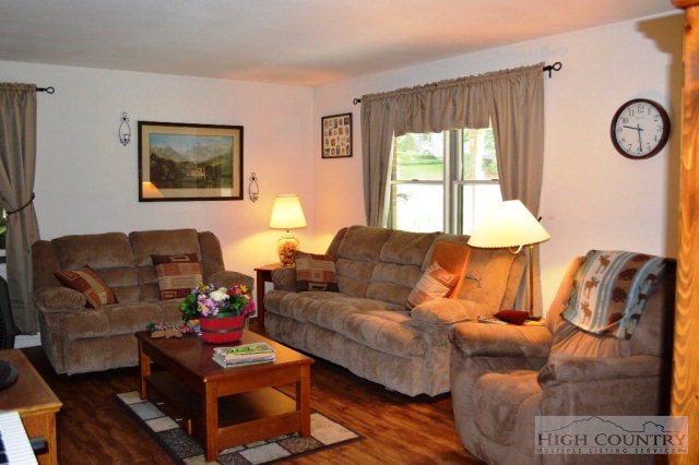 277 Pioneer Ridge Sparta, NC 28675 - Photo 31 of 36 a living room with furniture and a large window
