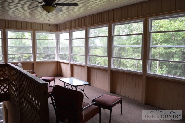 277 Pioneer Ridge Sparta, NC 28675 - Photo 6 of 36 a view of a dining room with furniture window and outside view