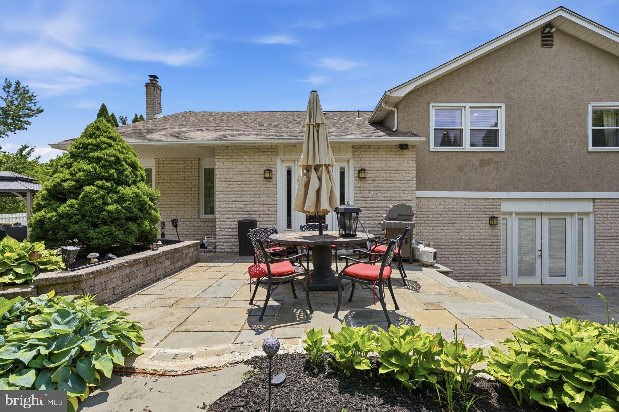 1002 Tannerie Run Road Ambler, PA 19002 - Photo 17 of 67 Charming patio oasis for outdoor living.