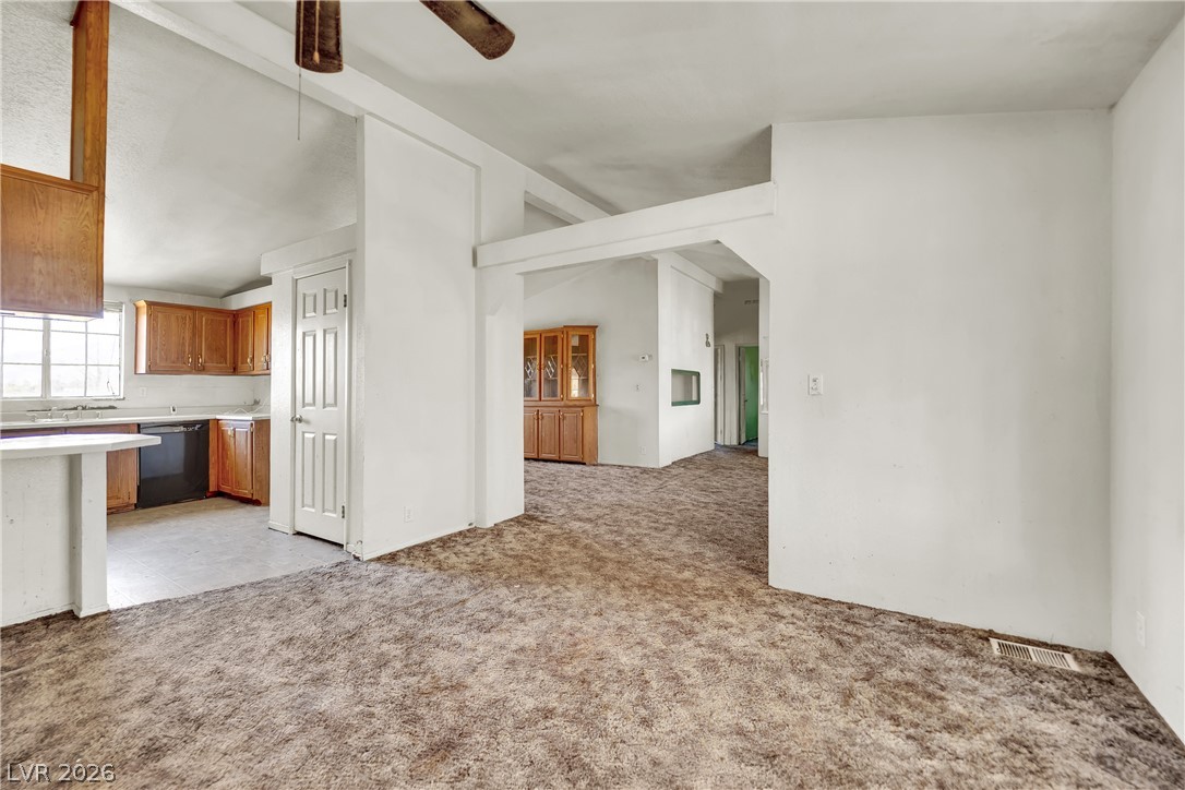 4361 Maple Road Pahrump, NV 89048 - Photo 46 of 46 An open floorplan offers clear sightlines from the kitchen to the expansive living area.