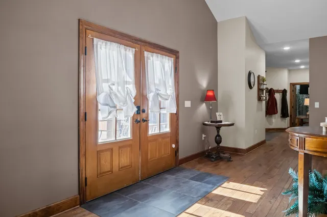 a kitchen with stainless steel appliances granite countertop a sink and cabinets