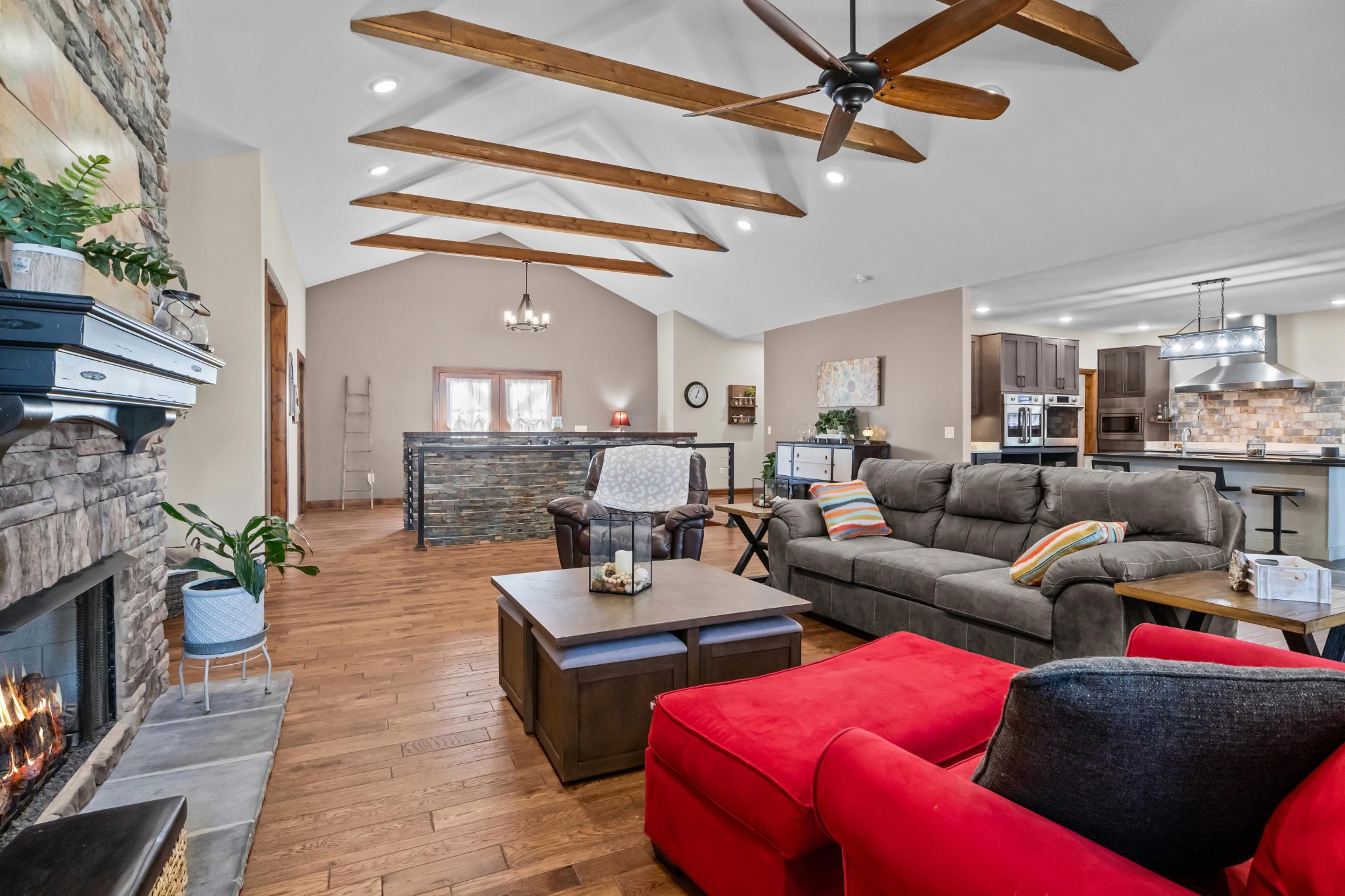 1816 McKelvy Road Camden, TN 38320 - Photo 14 of 100 a living room with furniture a fireplace and a chandelier