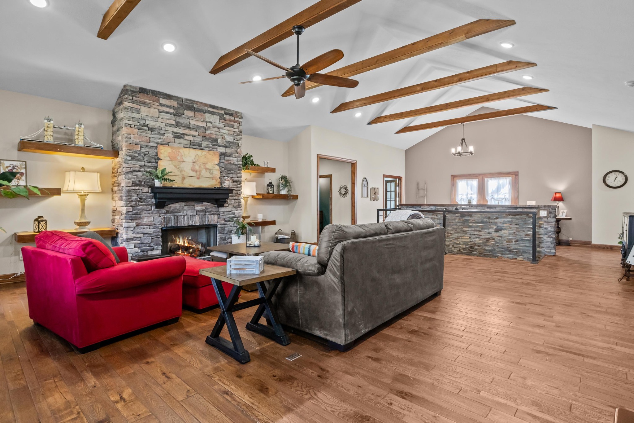 1816 McKelvy Road Camden, TN 38320 - Photo 15 of 100 a living room with furniture a flat screen tv and a fireplace