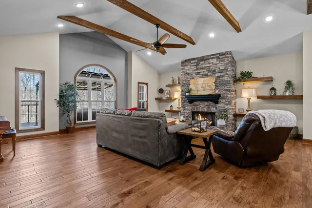a dining room with furniture and window