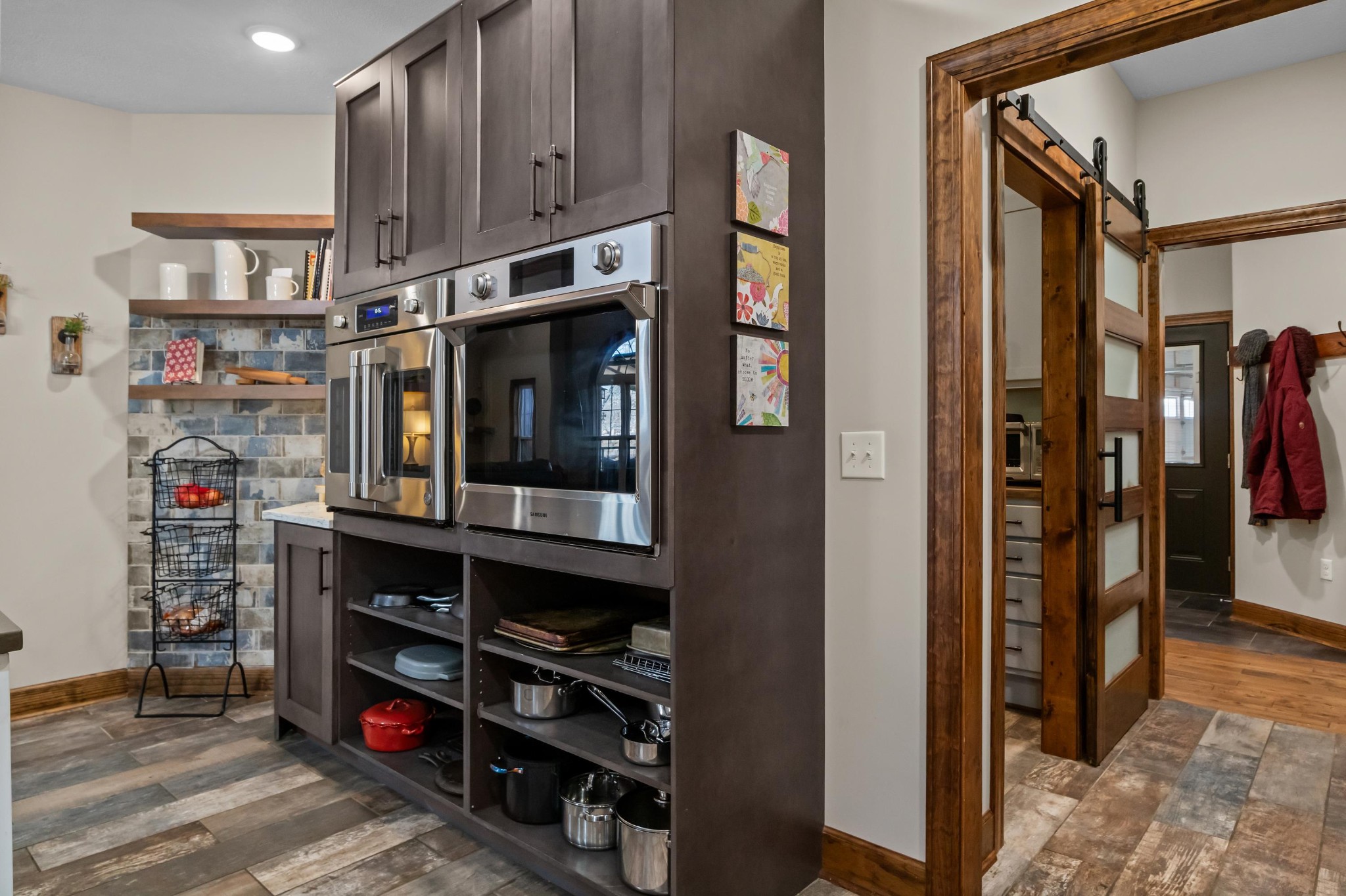 1816 McKelvy Road Camden, TN 38320 - Photo 21 of 100 a view of walk in closet with clothes and shoes