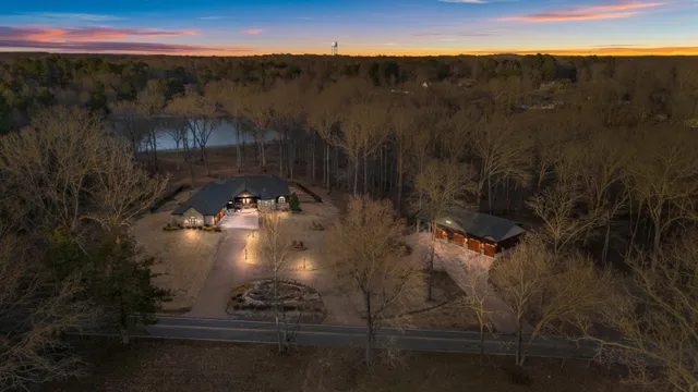 a building outdoor space with patio furniture and potted plants