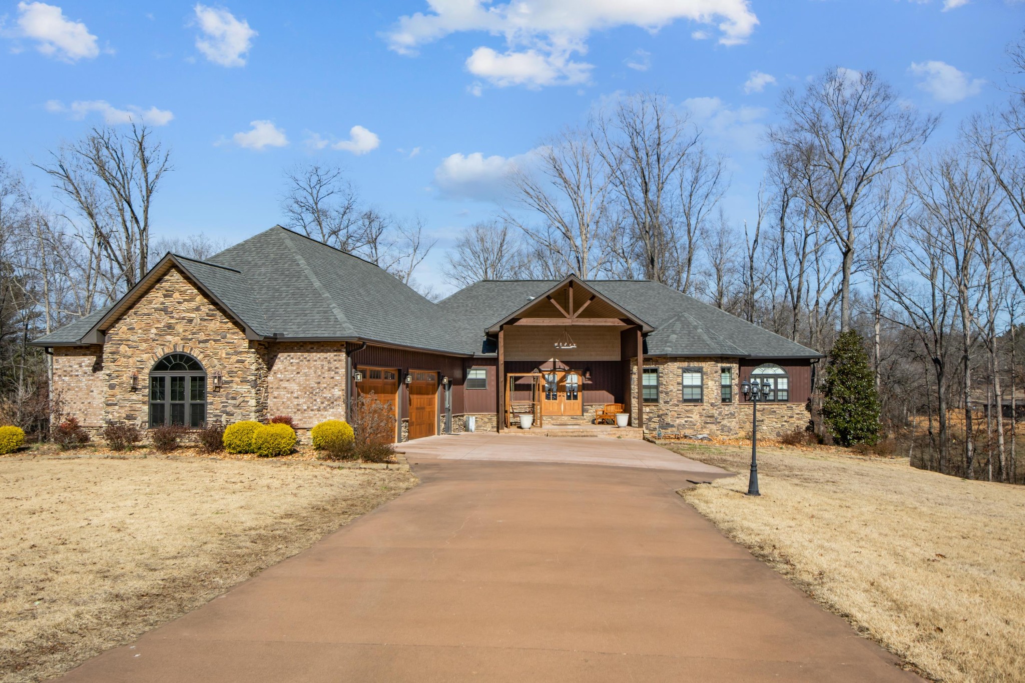 1816 McKelvy Road Camden, TN 38320 - Photo 6 of 100 a view of a house with snow on the road