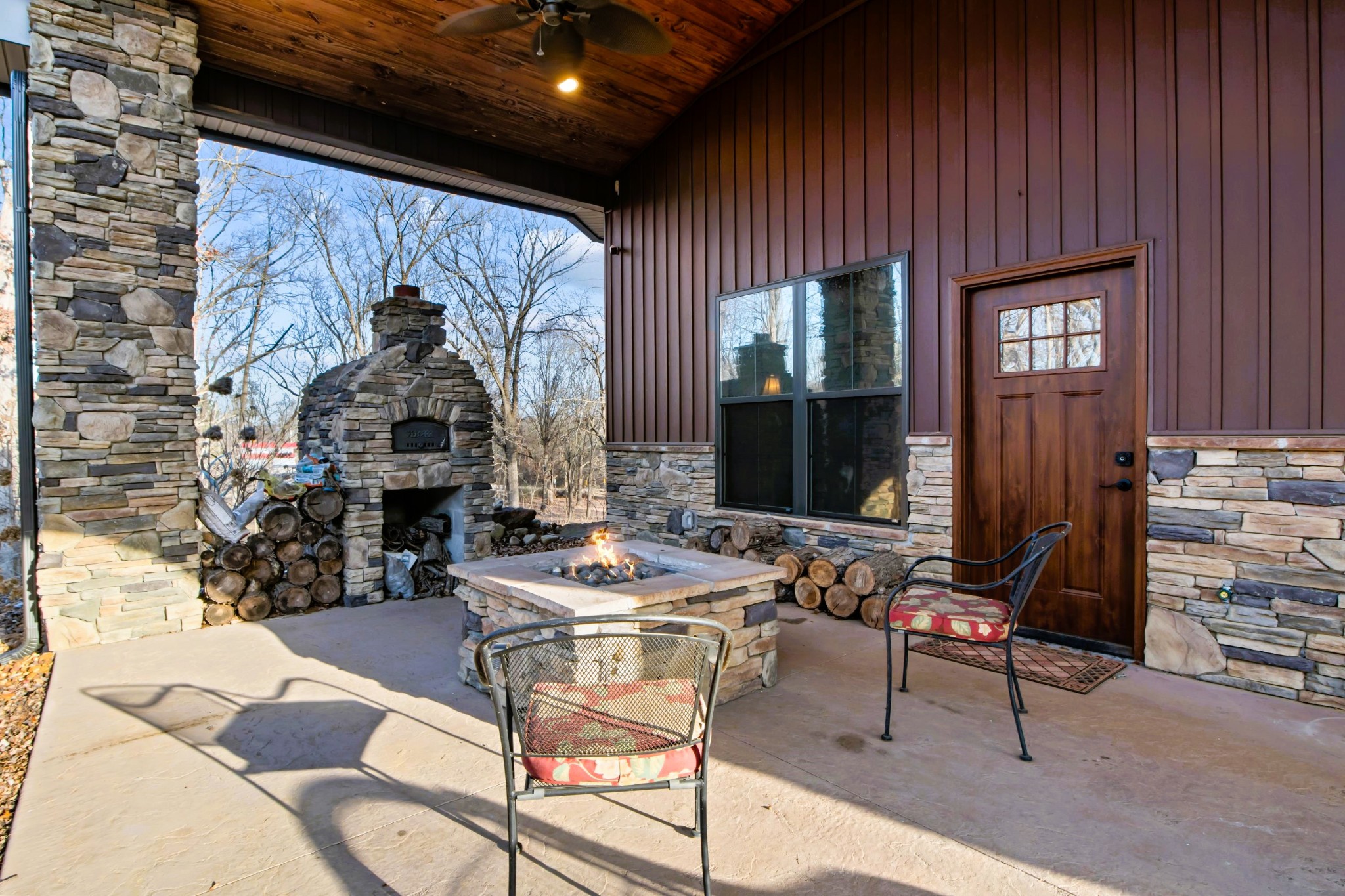 1816 McKelvy Road Camden, TN 38320 - Photo 81 of 100 a living room with furniture a window and a fireplace
