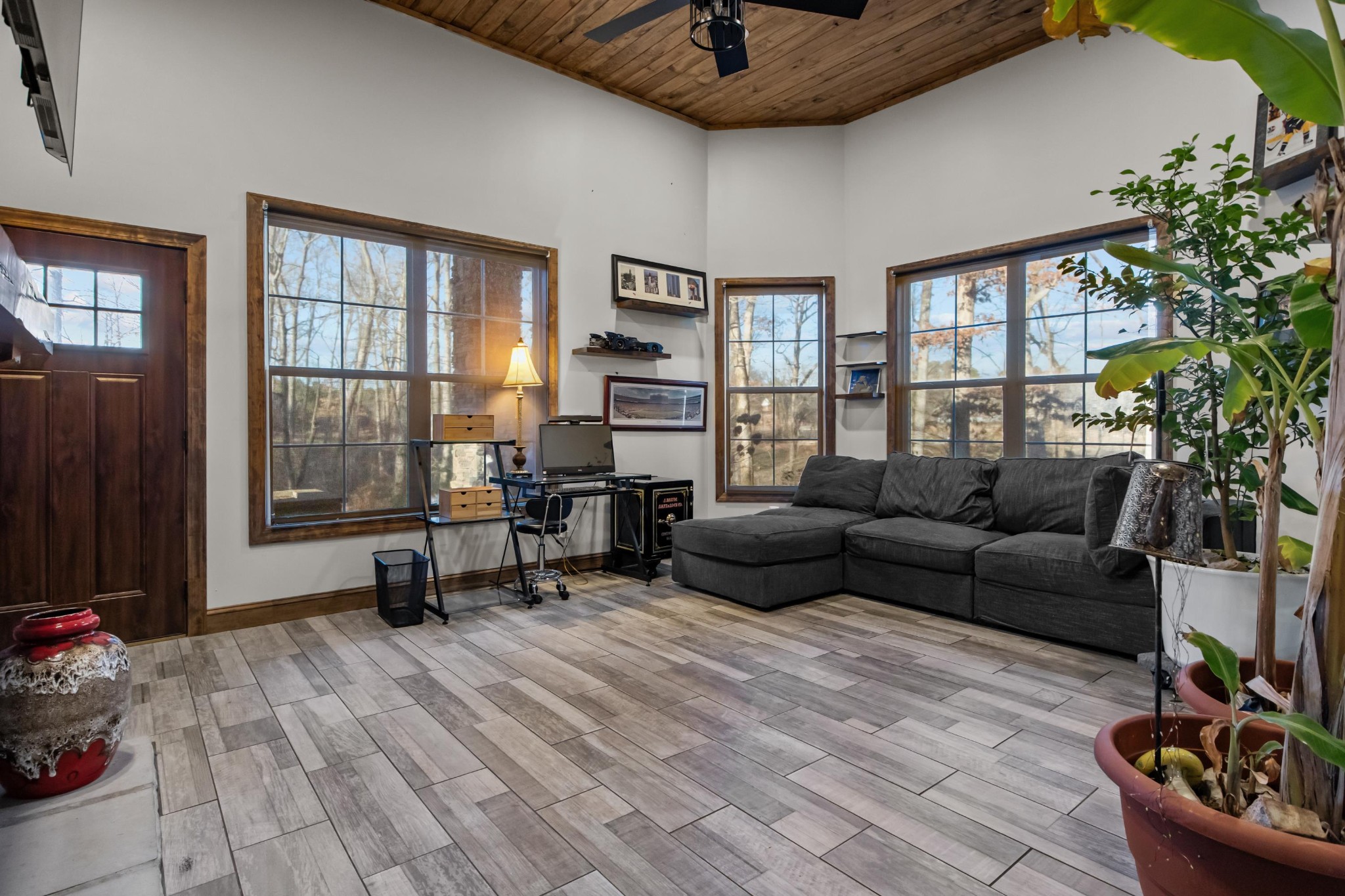 1816 McKelvy Road Camden, TN 38320 - Photo 84 of 100 a living room with furniture and a window