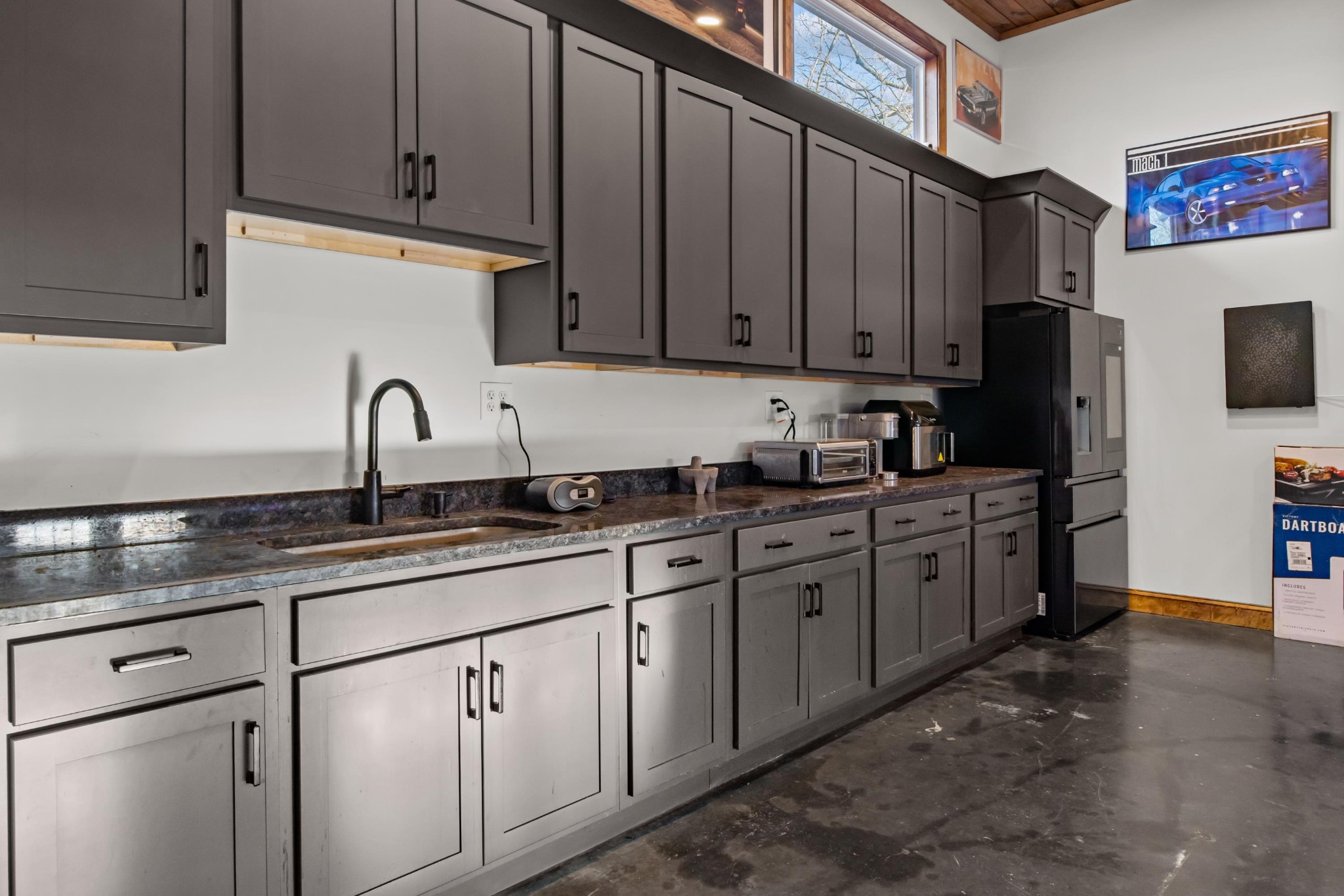 1816 McKelvy Road Camden, TN 38320 - Photo 87 of 100 a kitchen with stainless steel appliances granite countertop a sink stove and refrigerator