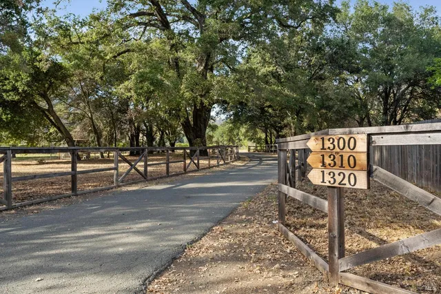 a sign board with parking space