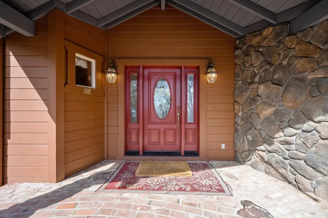 a front view of a house with garden