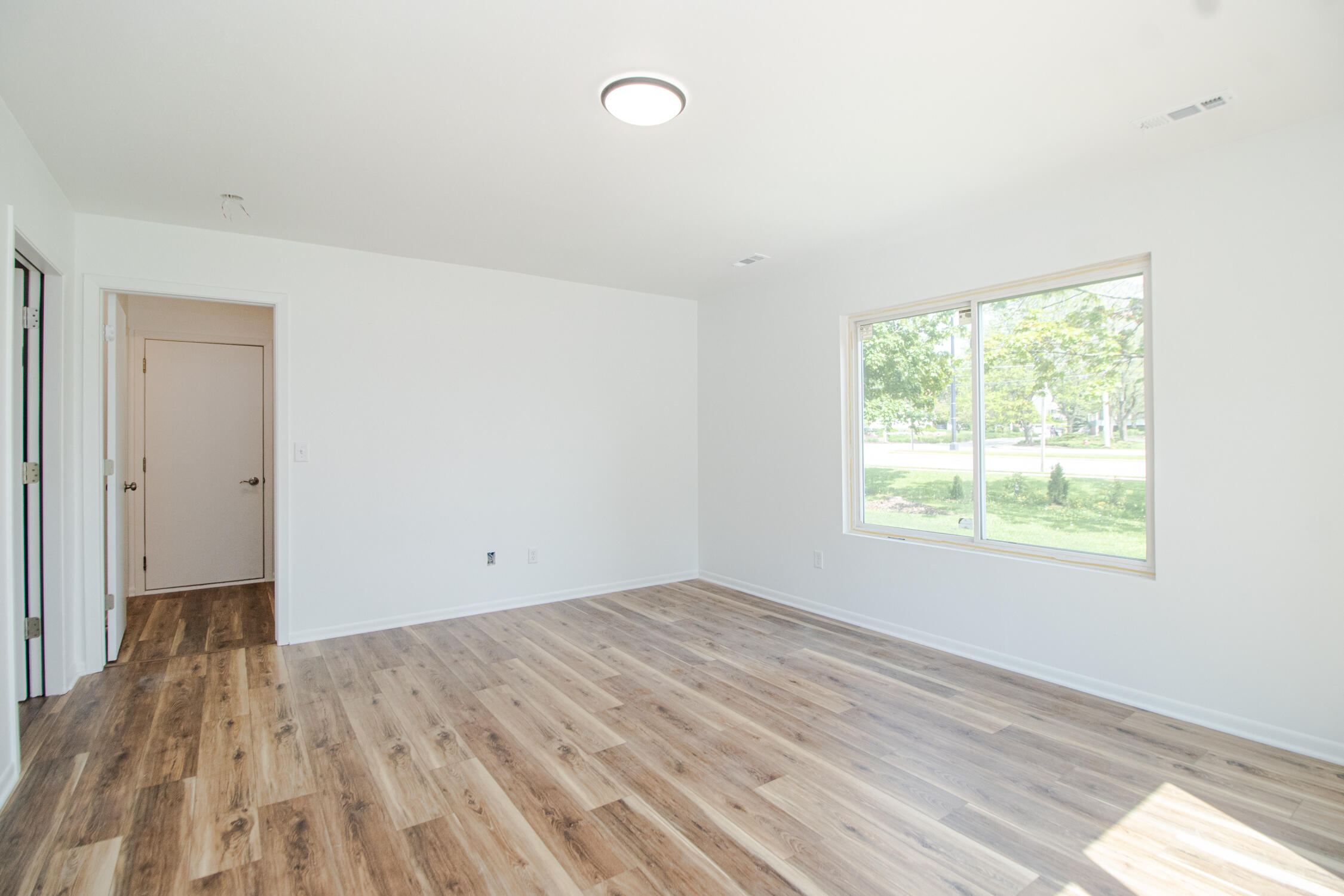 1410 South River Road New Berlin, WI 53151 - Photo 32 of 41 Lower Level Living Room
