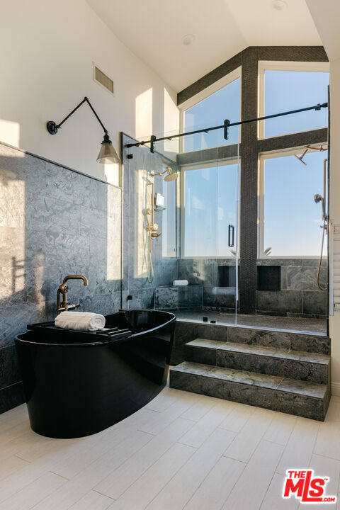 401 Moonrise Drive Malibu, CA 90265 - Photo 26 of 47 a kitchen with a sink and a refrigerator