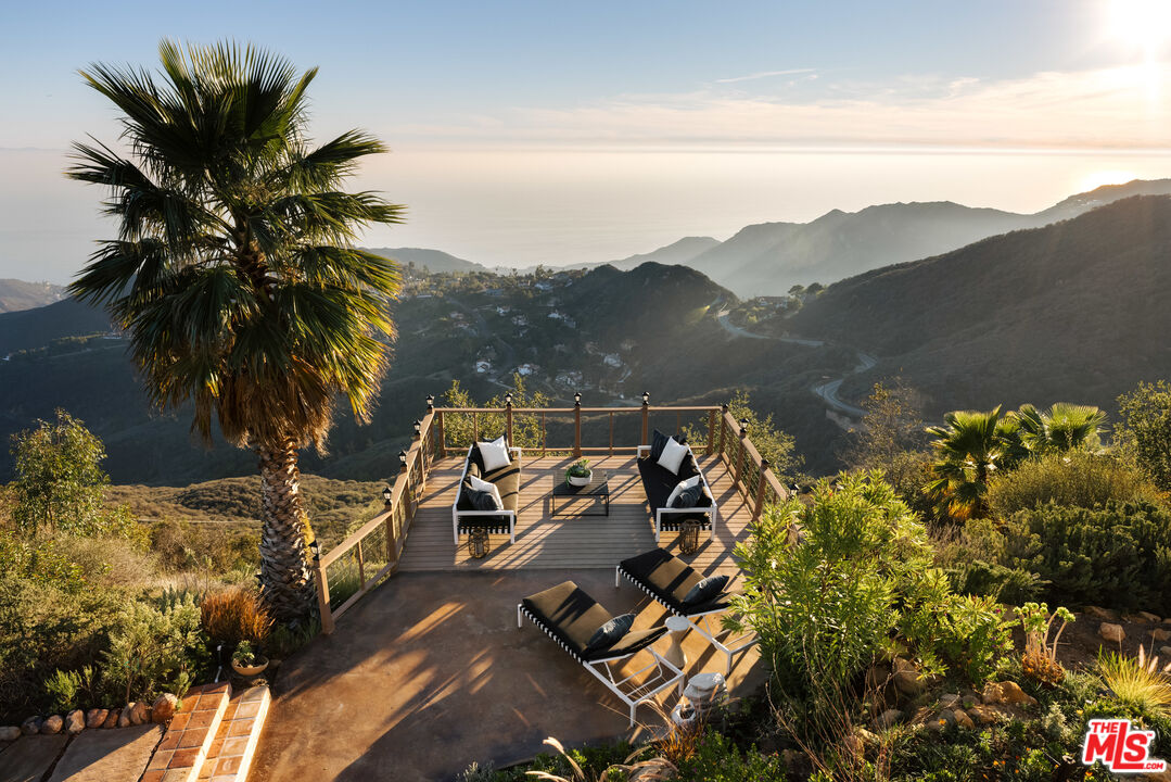 401 Moonrise Drive Malibu, CA 90265 - Photo 3 of 47 a view of a city with a mountain