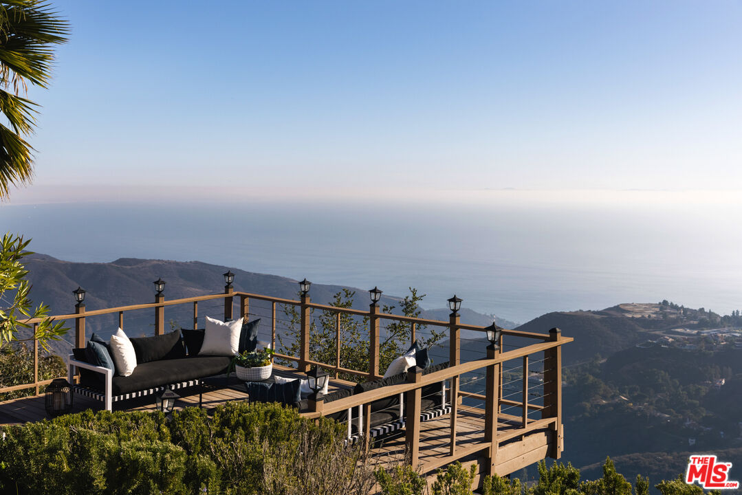 401 Moonrise Drive Malibu, CA 90265 - Photo 36 of 47 a view of a terrace with sitting area