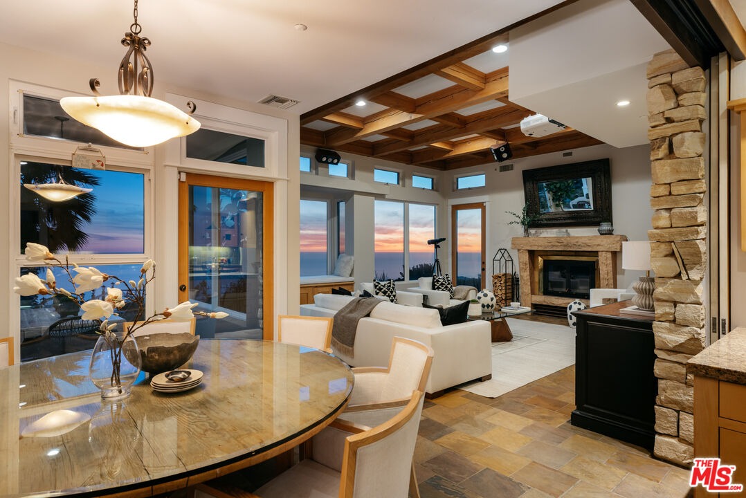 401 Moonrise Drive Malibu, CA 90265 - Photo 41 of 47 a living room with fireplace furniture and a flat screen tv