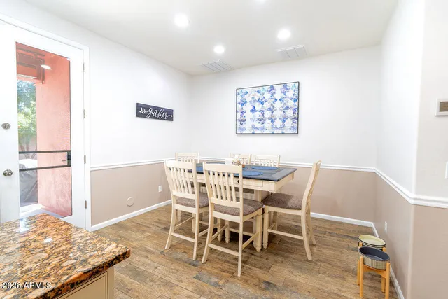a view of a dining room with furniture