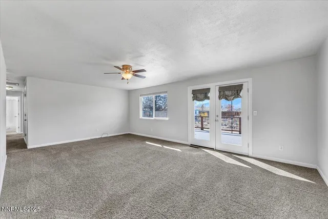 a large kitchen with kitchen island a large counter space a sink and appliances