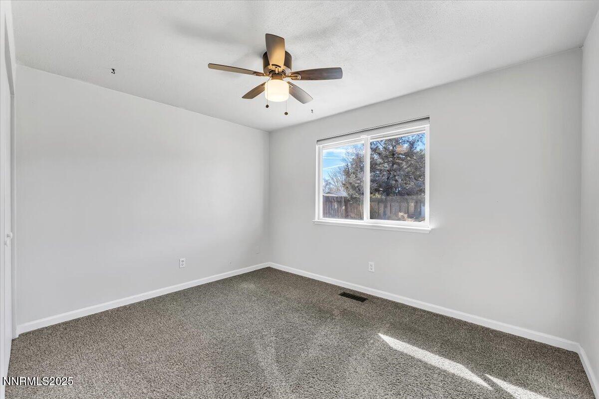 1275 Bolivia Way Gardnerville, NV 89460 - Photo 25 of 59 an empty room with a window