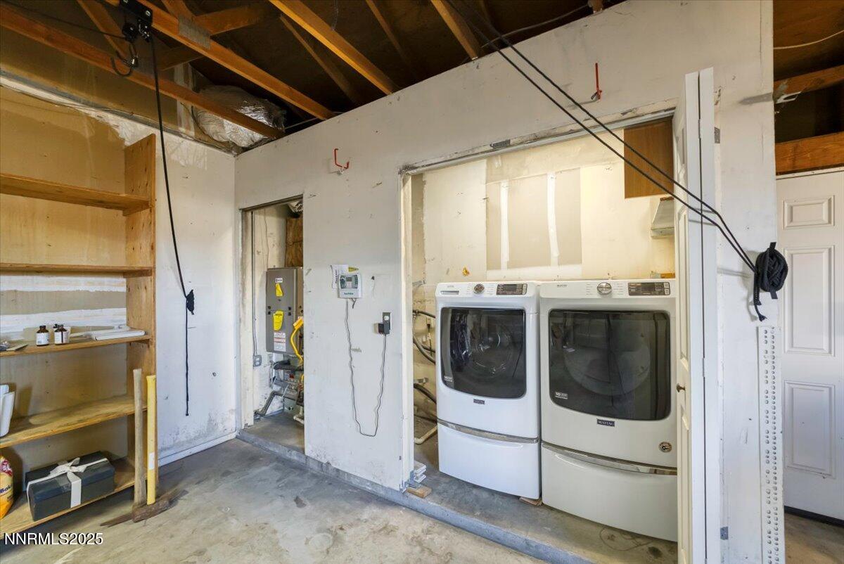 1275 Bolivia Way Gardnerville, NV 89460 - Photo 28 of 59 a view of a hallway with washer and dryer