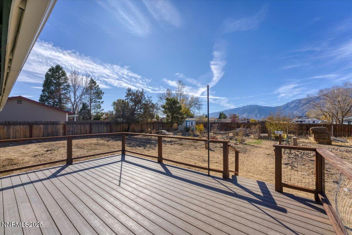 1275 Bolivia Way Gardnerville, NV 89460 - Photo 39 of 59 a view of a terrace with wooden floor and outdoor seating