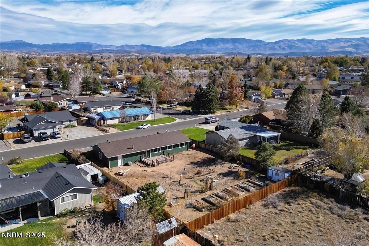 1275 Bolivia Way Gardnerville, NV 89460 - Photo 43 of 59 an aerial view of a city with mountains