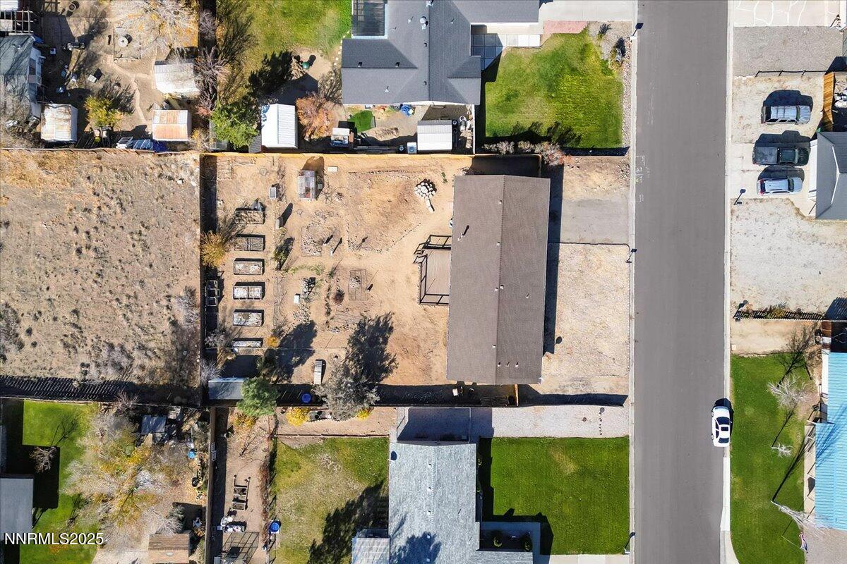 1275 Bolivia Way Gardnerville, NV 89460 - Photo 58 of 59 aerial view of a house with a yard and large trees