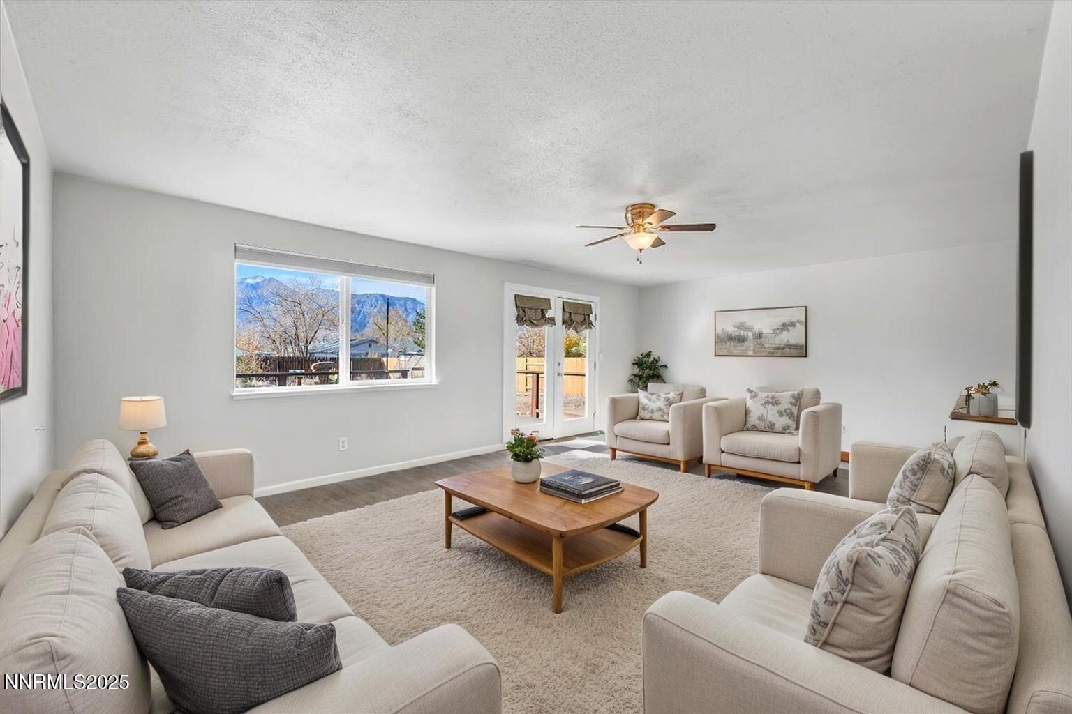 1275 Bolivia Way Gardnerville, NV 89460 - Photo 10 of 59 a living room with furniture and a large window