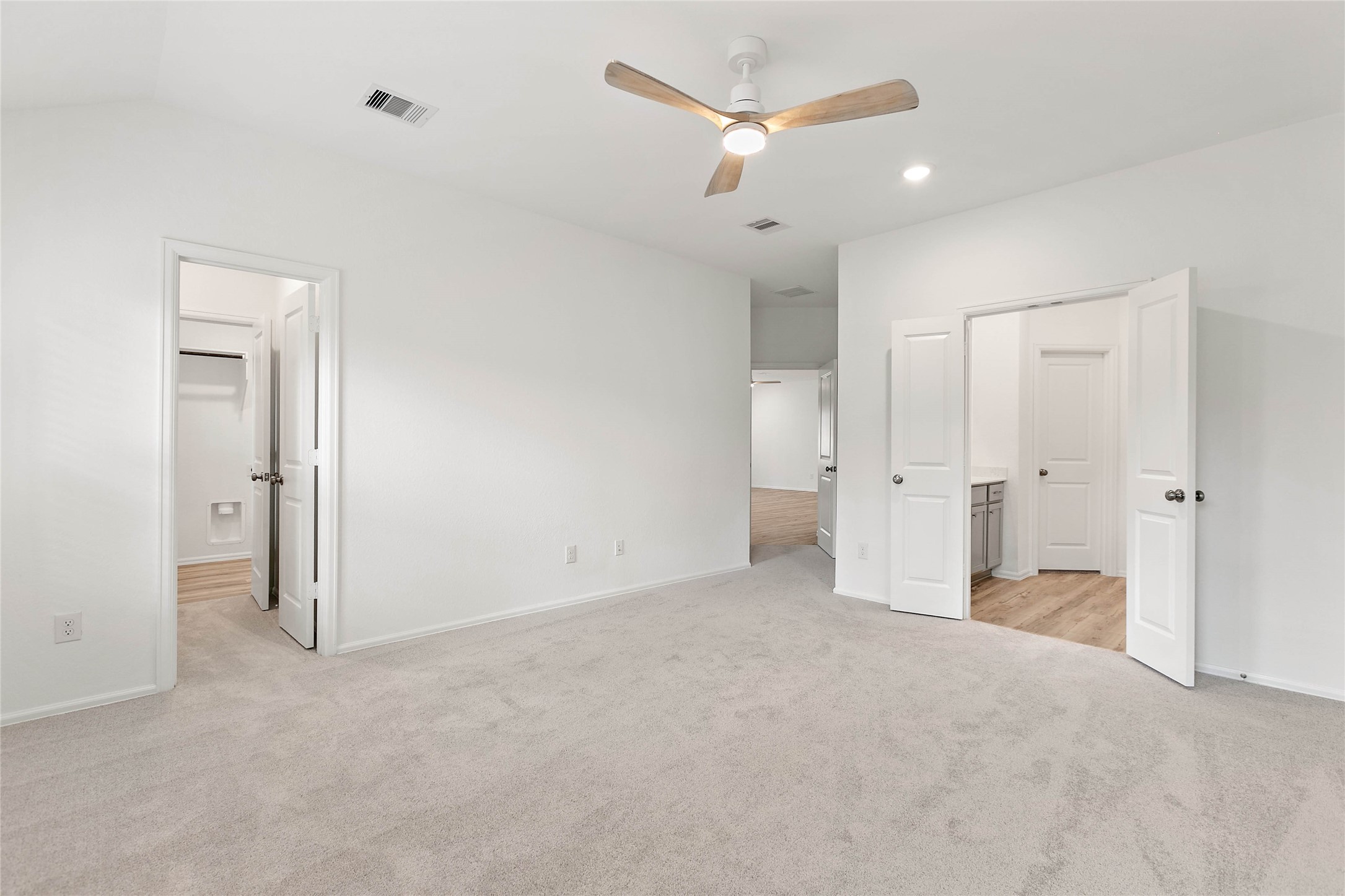 7602 Angels Lndg Lane Porter, TX 77365 - Photo 14 of 32 From the primary bedroom, enjoy quick access to the laundry room through closet #2.