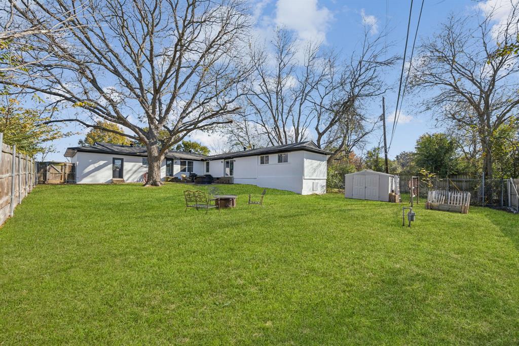207 Joe White Street Rockwall, TX 75087 - Photo 25 of 27 a house view with backyard space