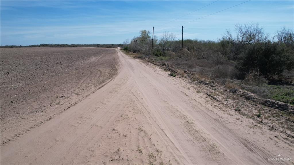 17 Mile 17 Road Edinburg, TX 78541 - Photo 2 of 2 a view of a dry yard with wooden floor and lake view
