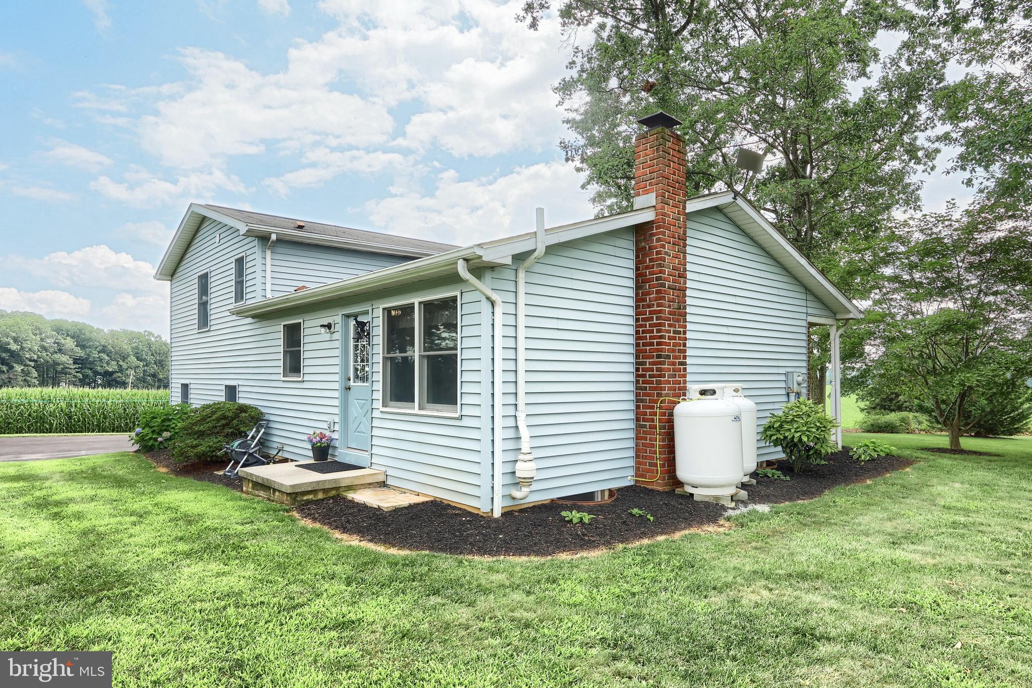 785 Gebhart Road Windsor, PA 17366 - Photo 17 of 45 a view of a white house next to a yard