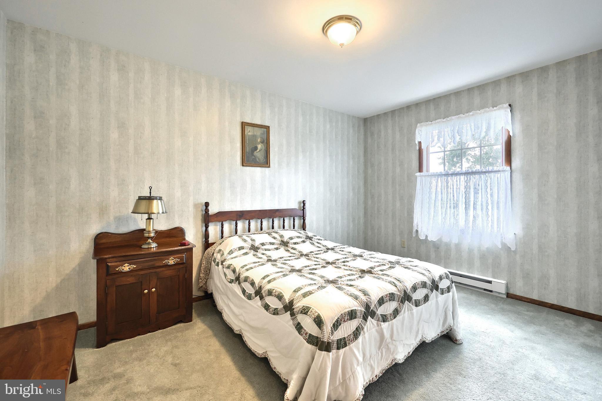 785 Gebhart Road Windsor, PA 17366 - Photo 30 of 45 a bedroom with a bed and a window