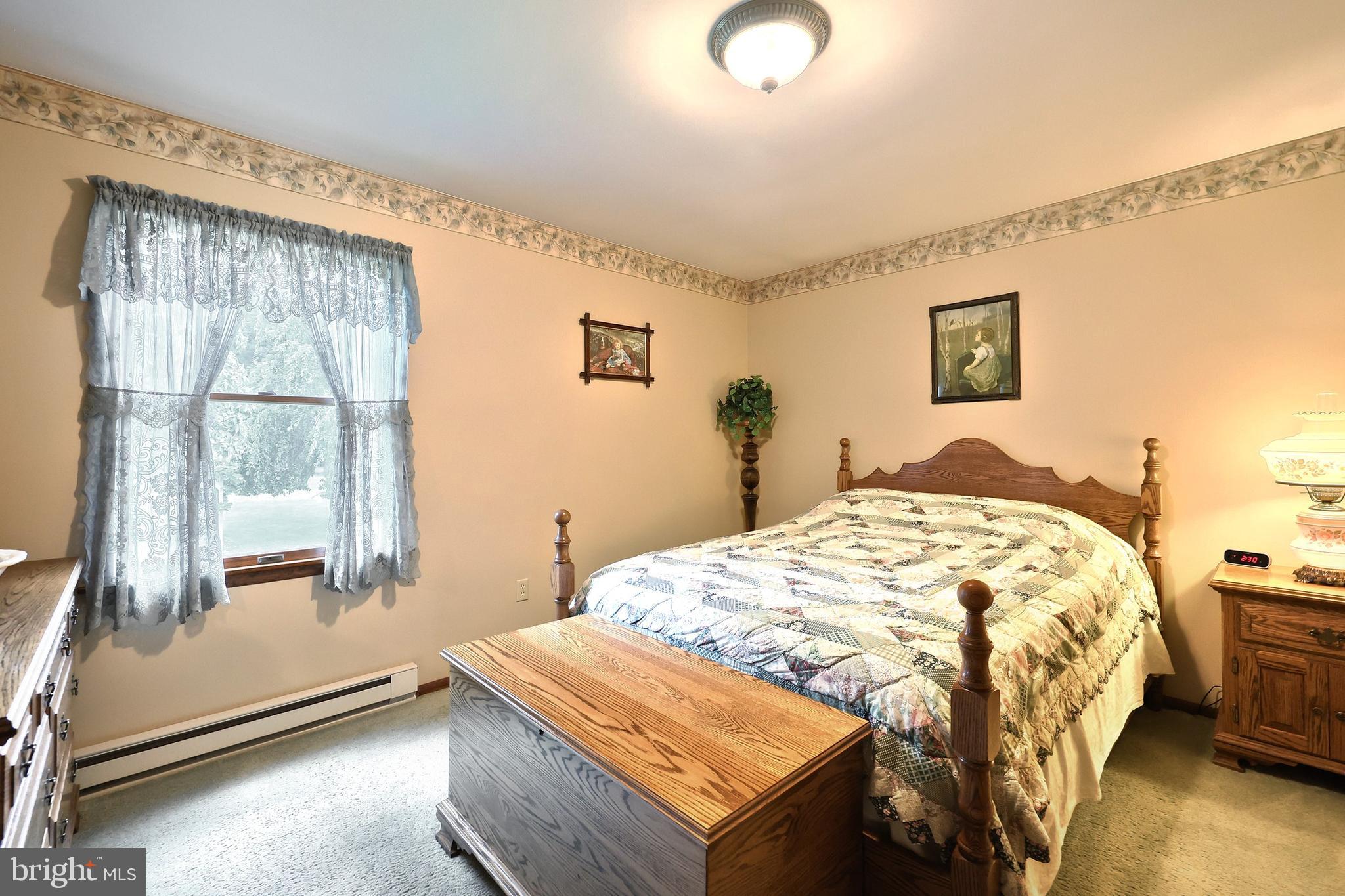 785 Gebhart Road Windsor, PA 17366 - Photo 32 of 45 a bedroom with a bed and a window
