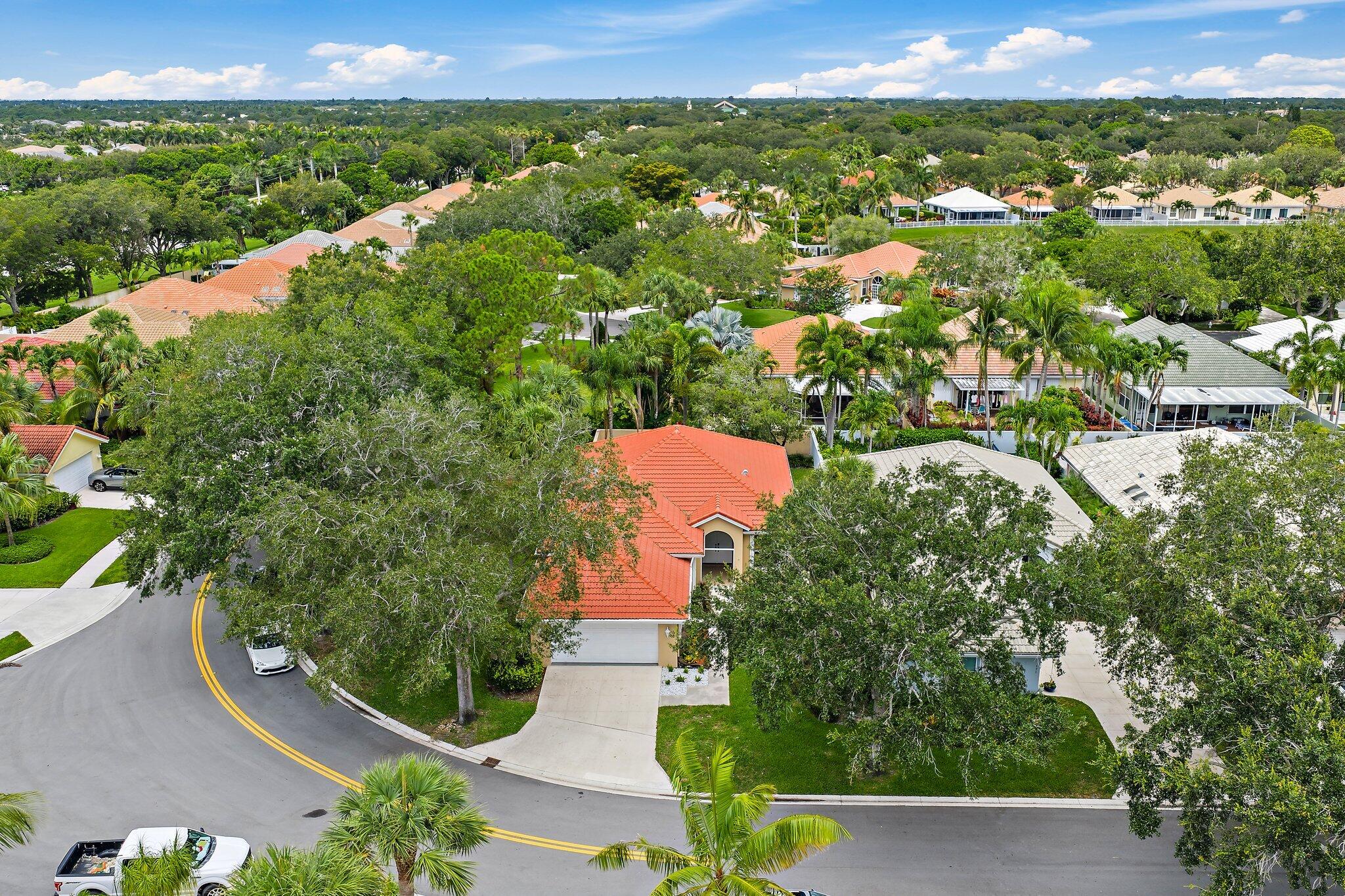 173 East Hampton Way Jupiter, FL 33458 - Photo 1 of 28 an aerial view of a house with a yard