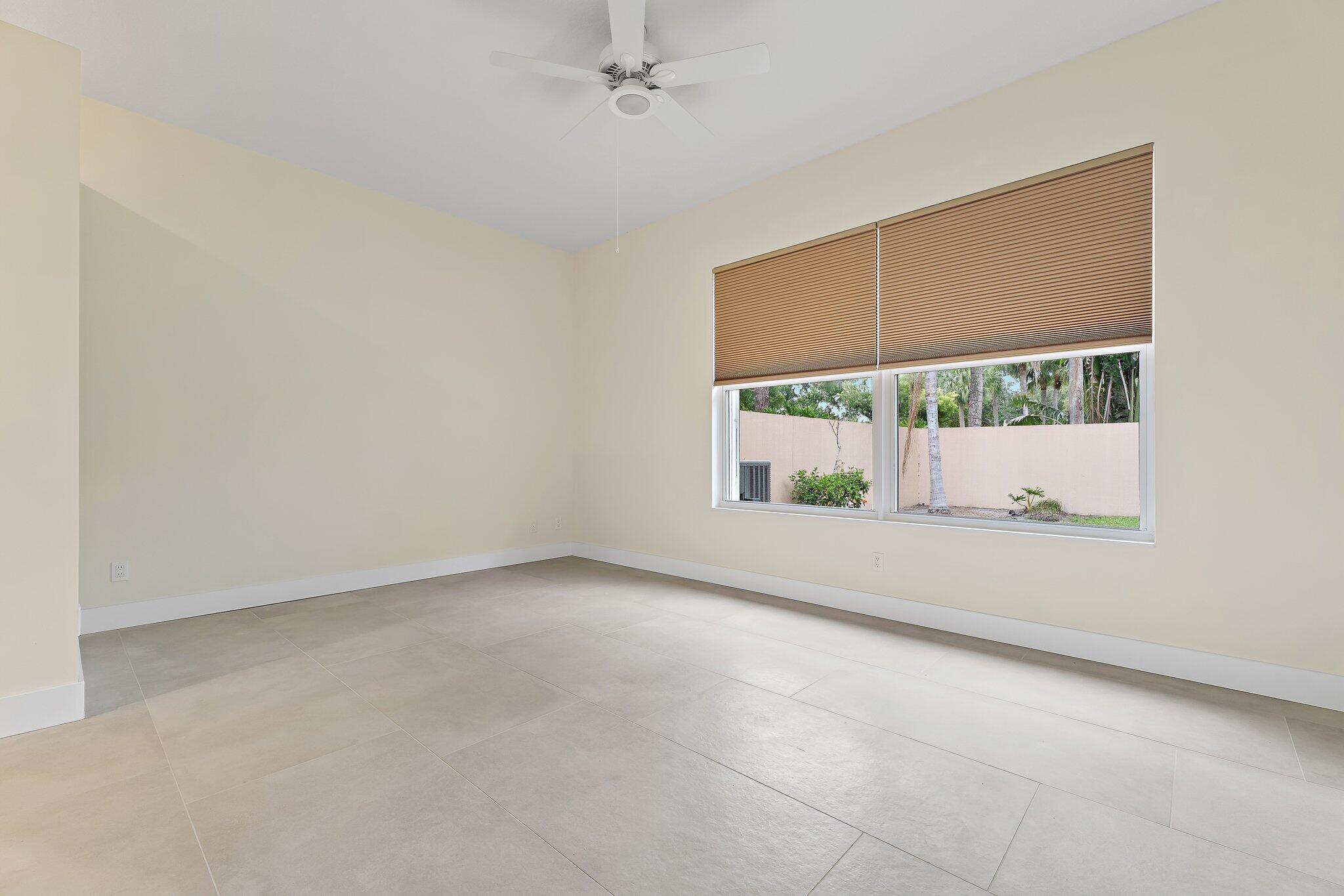 173 East Hampton Way Jupiter, FL 33458 - Photo 15 of 28 an empty room with large window