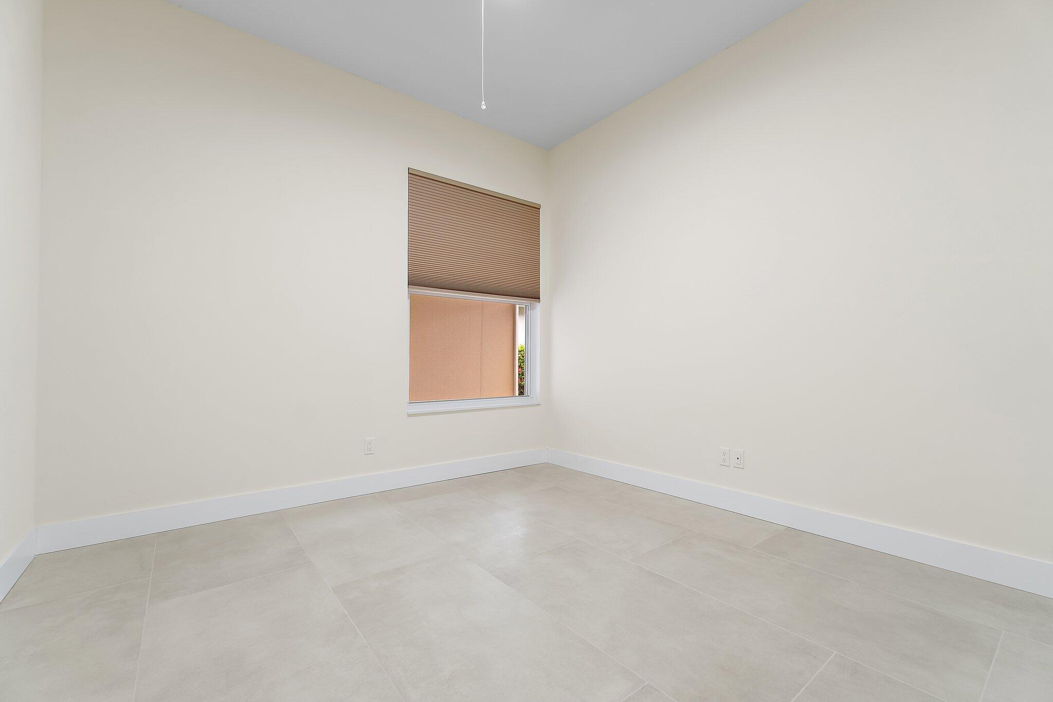 173 East Hampton Way Jupiter, FL 33458 - Photo 19 of 28 an empty room with a window