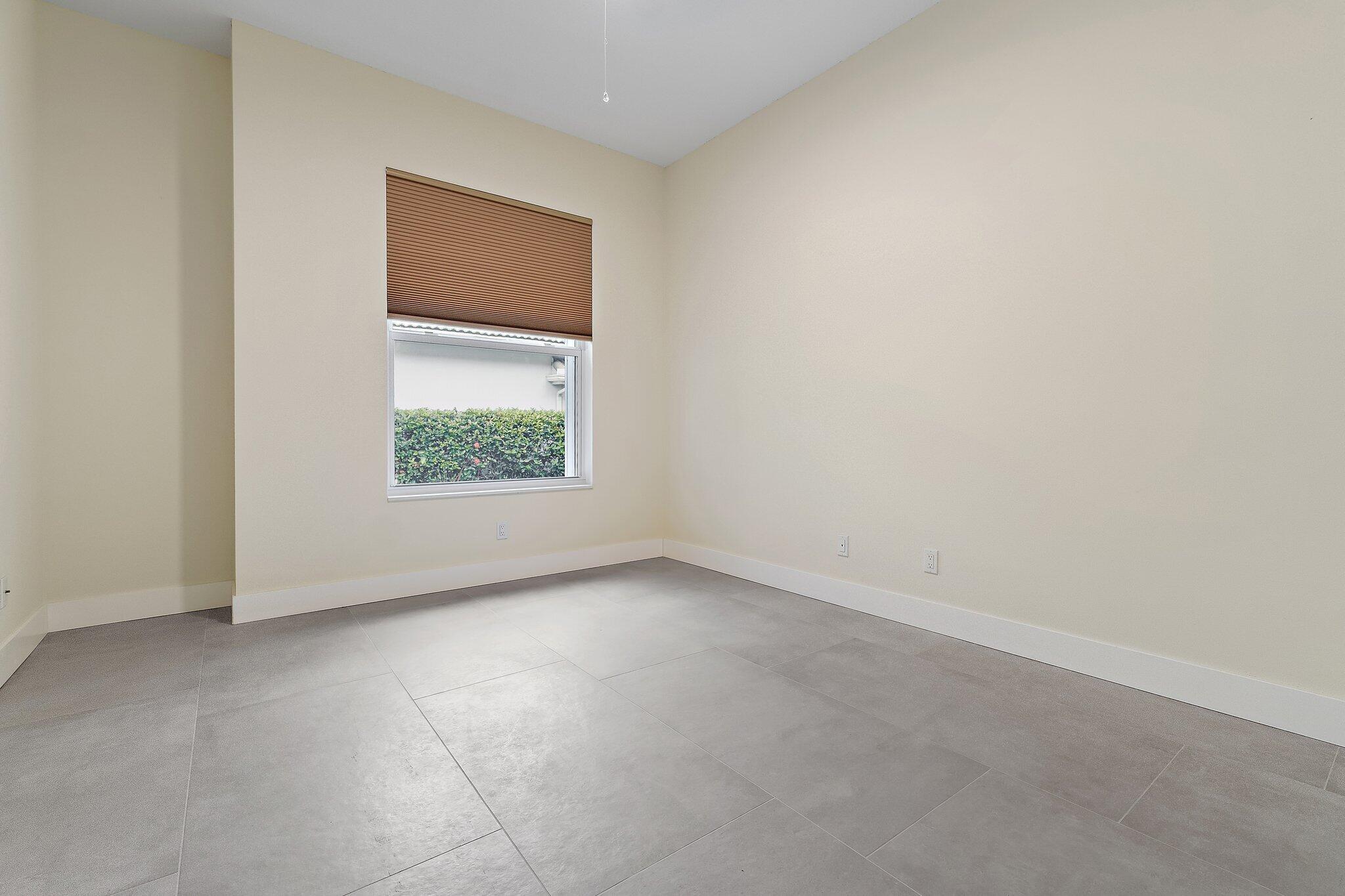 173 East Hampton Way Jupiter, FL 33458 - Photo 22 of 28 an empty room with a window