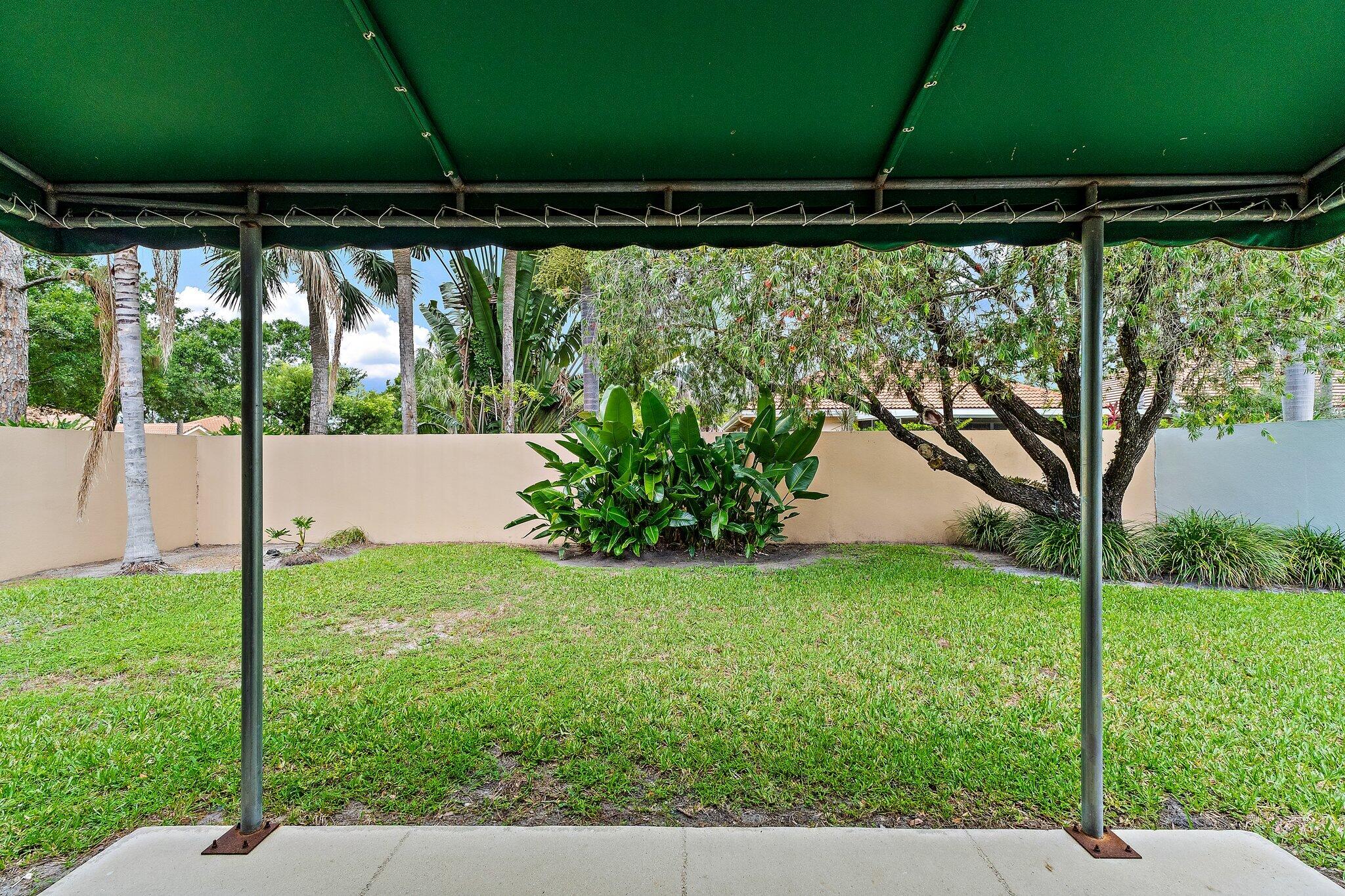 173 East Hampton Way Jupiter, FL 33458 - Photo 24 of 28 a view of a backyard