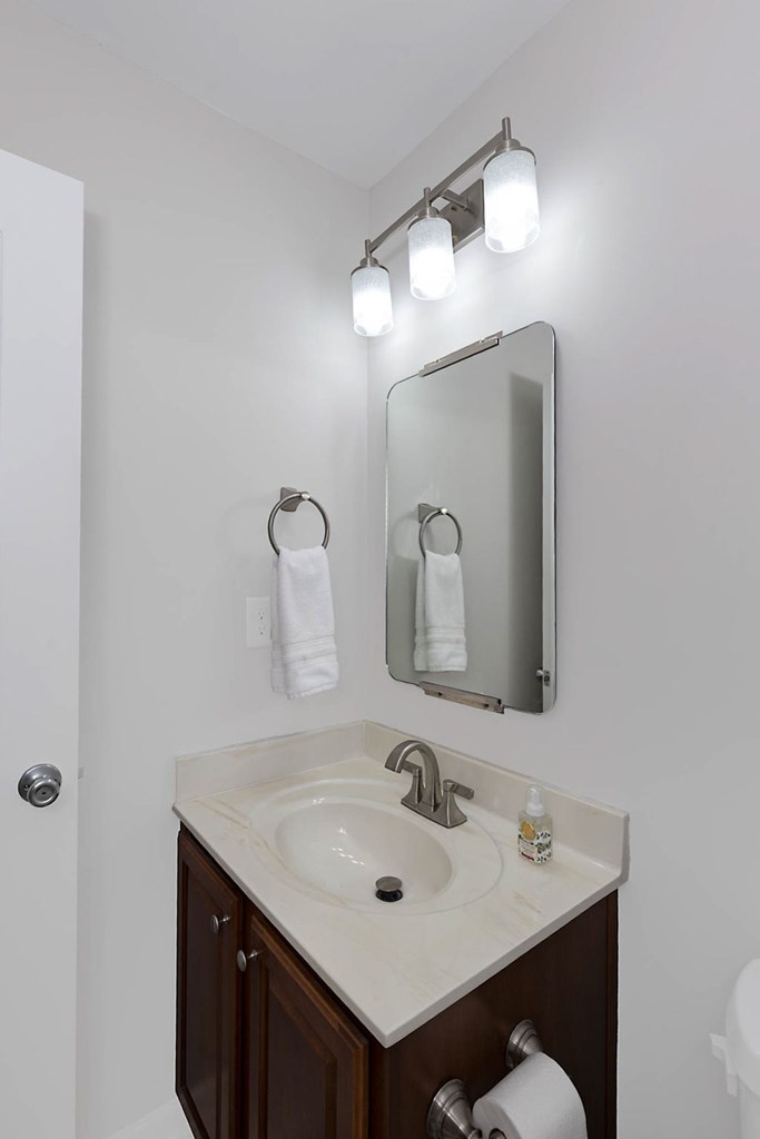 6712 Bridge Way Columbus, GA 31904 - Photo 26 of 36 a bathroom with a sink and a mirror