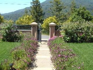 71 Ridgecrest Road Kentfield, CA 94904 - Photo 2 of 10 a sign that is sitting in front of flowers