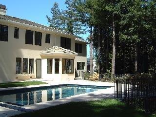 71 Ridgecrest Road Kentfield, CA 94904 - Photo 3 of 10 a front view of a house with a yard