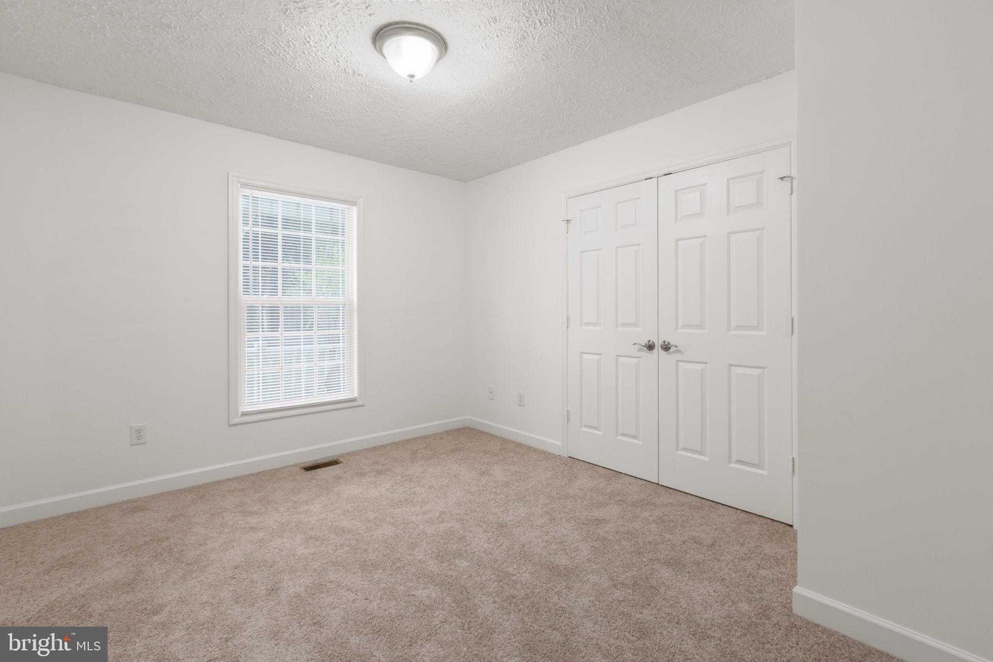 8401 Seays Road Spotsylvania, VA 22551 - Photo 13 of 32 Bedroom #1 is fully carpeted