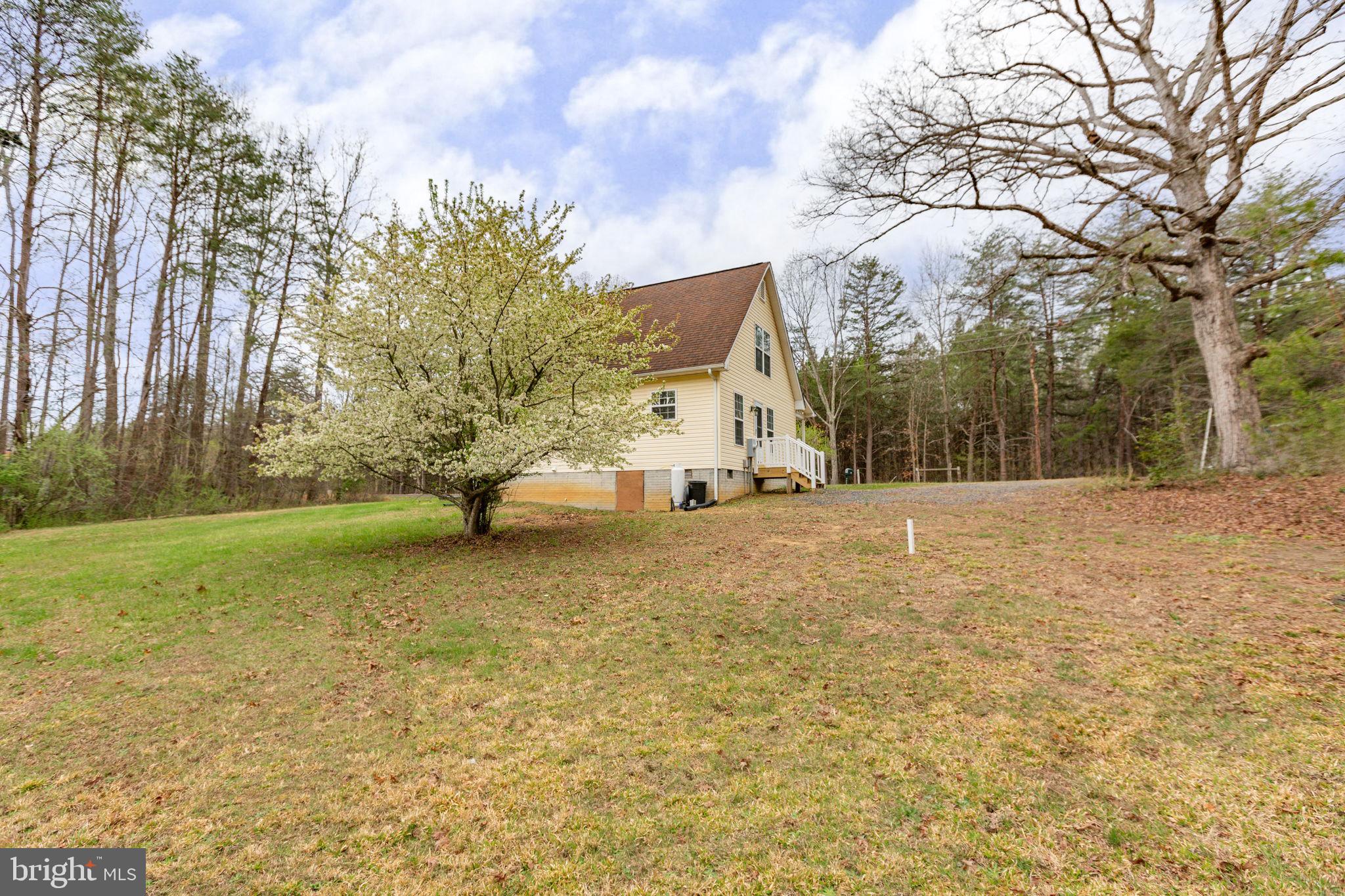 8401 Seays Road Spotsylvania, VA 22551 - Photo 30 of 32 Mature trees surround the property